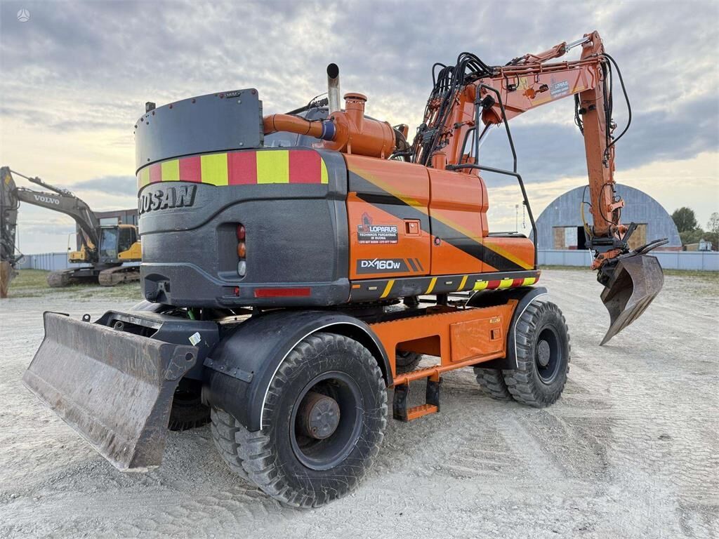 Doosan DX 160 W , ROTO + GRAPPLE - Колёсный экскаватор: фото 5 Doosan DX 160 W , ROTO + GRAPPLE - Колёсный экскаватор: фото 5