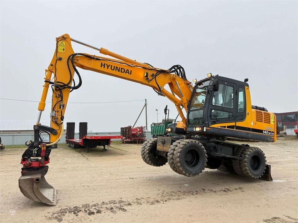 Hyundai Robex 140 W-7A ROTOTILT - Колёсный экскаватор: фото 1 Hyundai Robex 140 W-7A ROTOTILT - Колёсный экскаватор: фото 1
