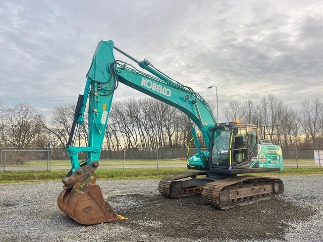 Kobelco SK210HLC-10E - Гусеничный экскаватор: фото 1 Kobelco SK210HLC-10E - Гусеничный экскаватор: фото 1