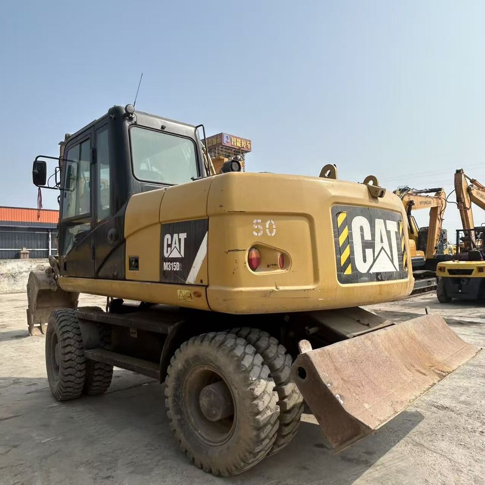 CATERPILLAR M315D2 - Колёсный экскаватор: фото 4 CATERPILLAR M315D2 - Колёсный экскаватор: фото 4