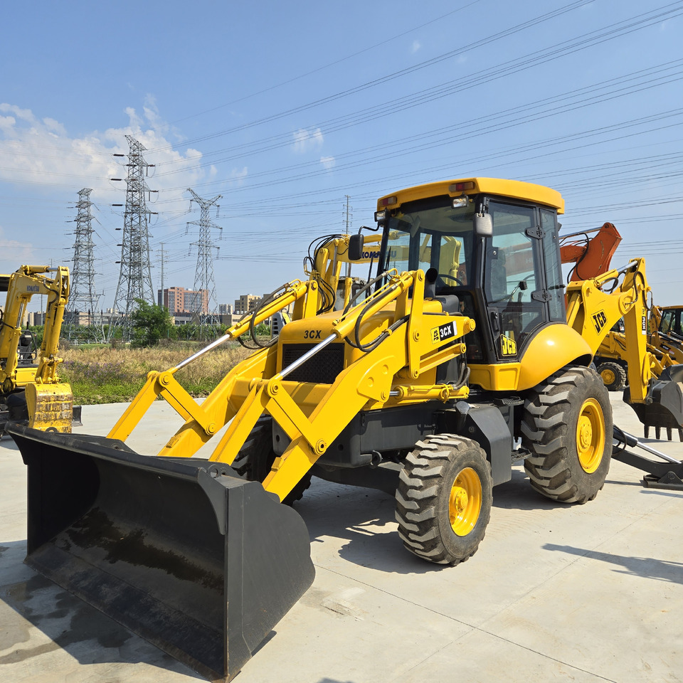 JCB 3CX - Экскаватор-погрузчик: фото 1 JCB 3CX - Экскаватор-погрузчик: фото 1