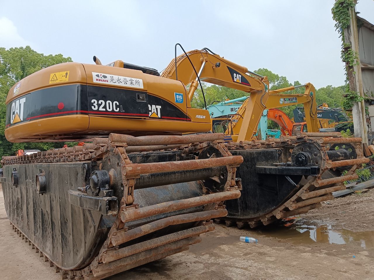 Водный экскаватор CAT 320CL: фото 1