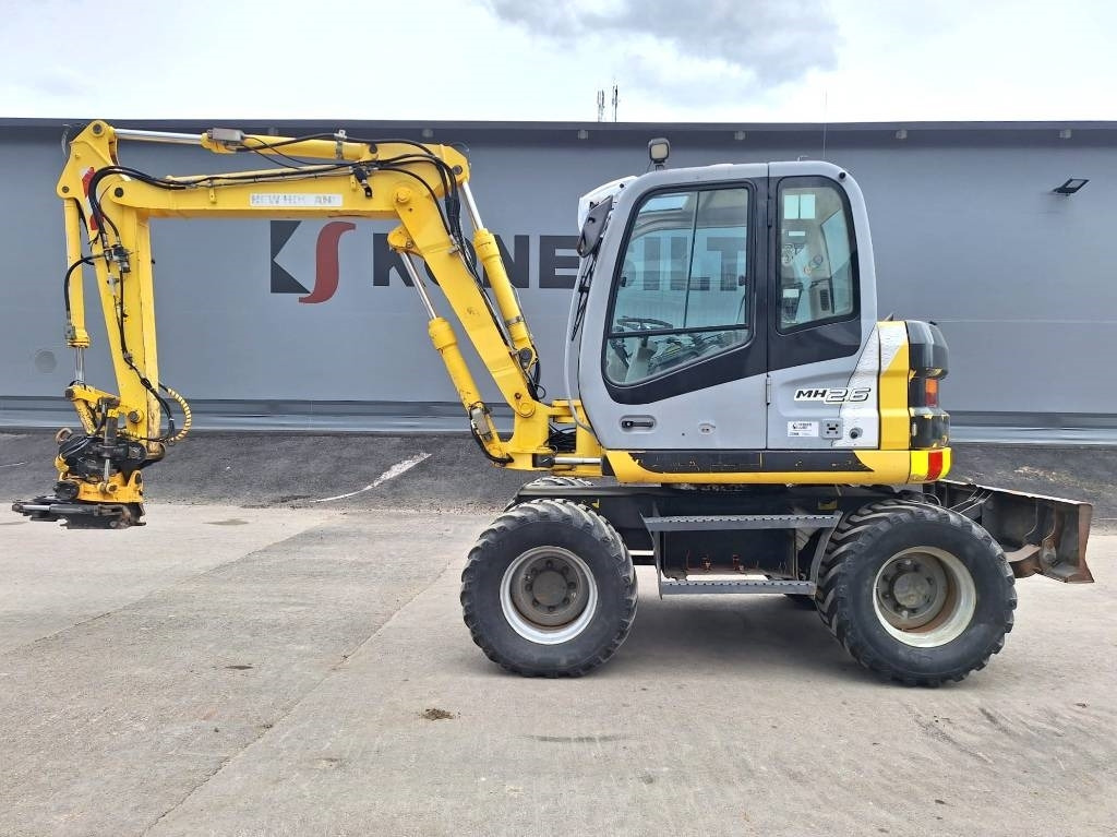 New Holland MYYTY! SOLD! MH2.6 ENGCON PIHDEILLÄ - Колёсный экскаватор: фото 1 New Holland MYYTY! SOLD! MH2.6 ENGCON PIHDEILLÄ - Колёсный экскаватор: фото 1