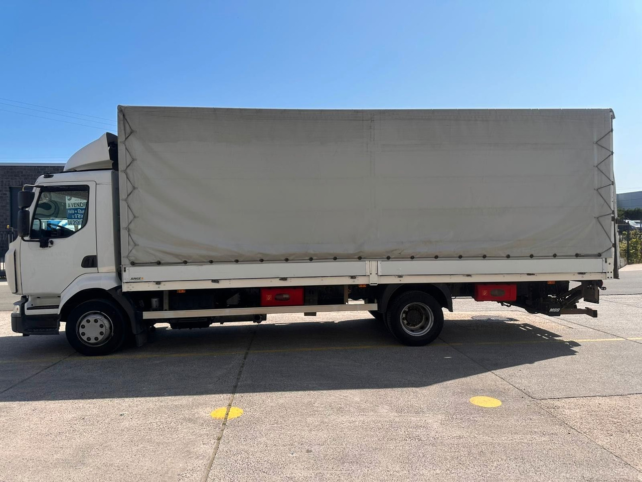 Renault Midlum dXi220-12. Klima. - Тентованный грузовик: фото 1 Renault Midlum dXi220-12. Klima. - Тентованный грузовик: фото 1