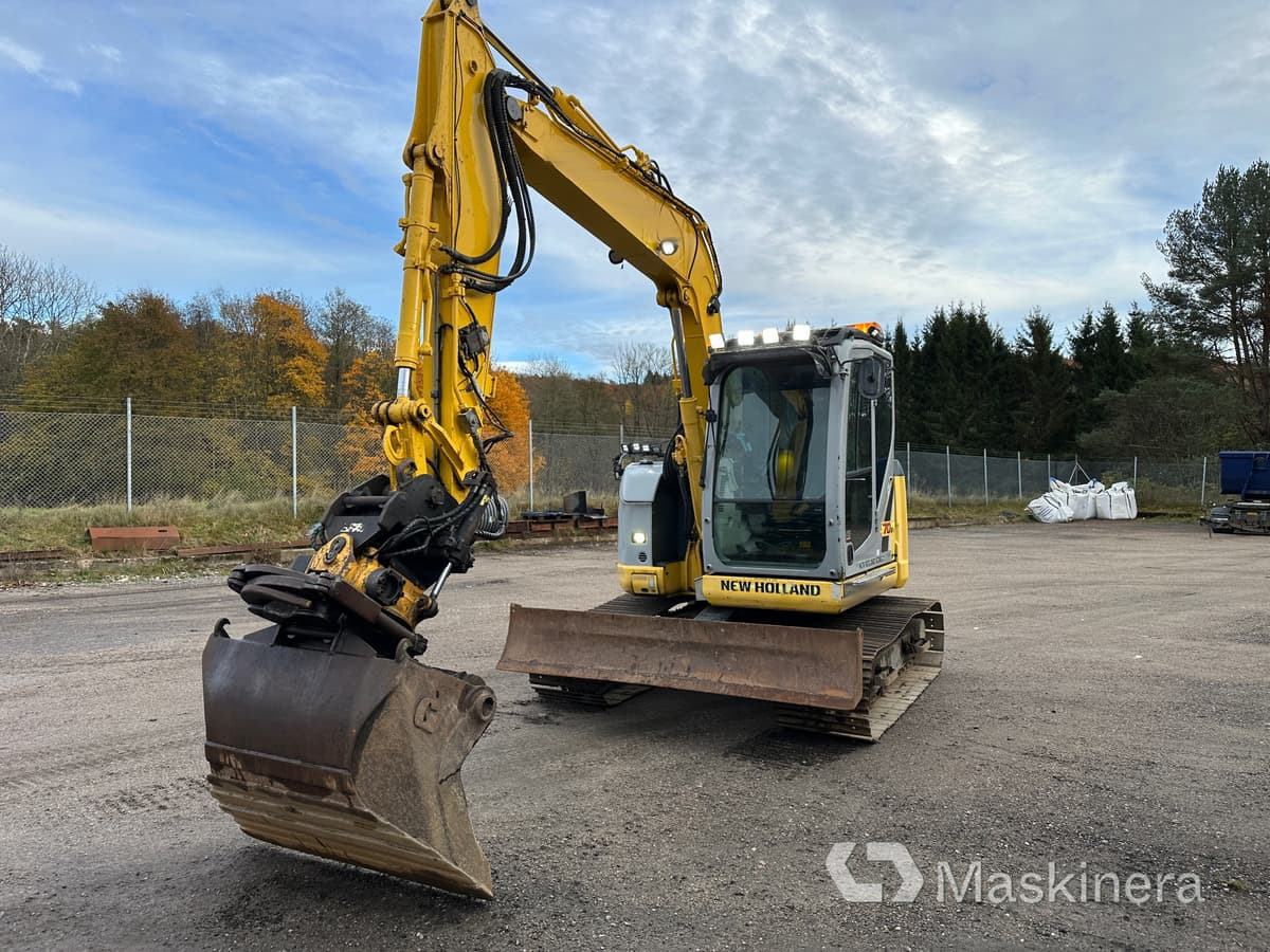 Grävmaskin New Holland Kobelco E70BSR-2 - Гусеничный экскаватор: фото 3 Grävmaskin New Holland Kobelco E70BSR-2 - Гусеничный экскаватор: фото 3