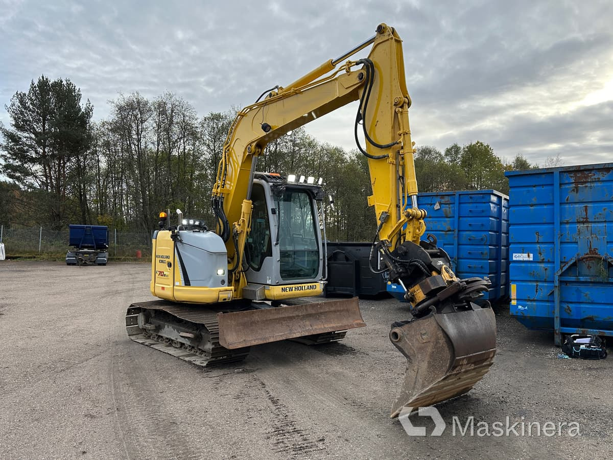 Grävmaskin New Holland Kobelco E70BSR-2 - Гусеничный экскаватор: фото 1 Grävmaskin New Holland Kobelco E70BSR-2 - Гусеничный экскаватор: фото 1
