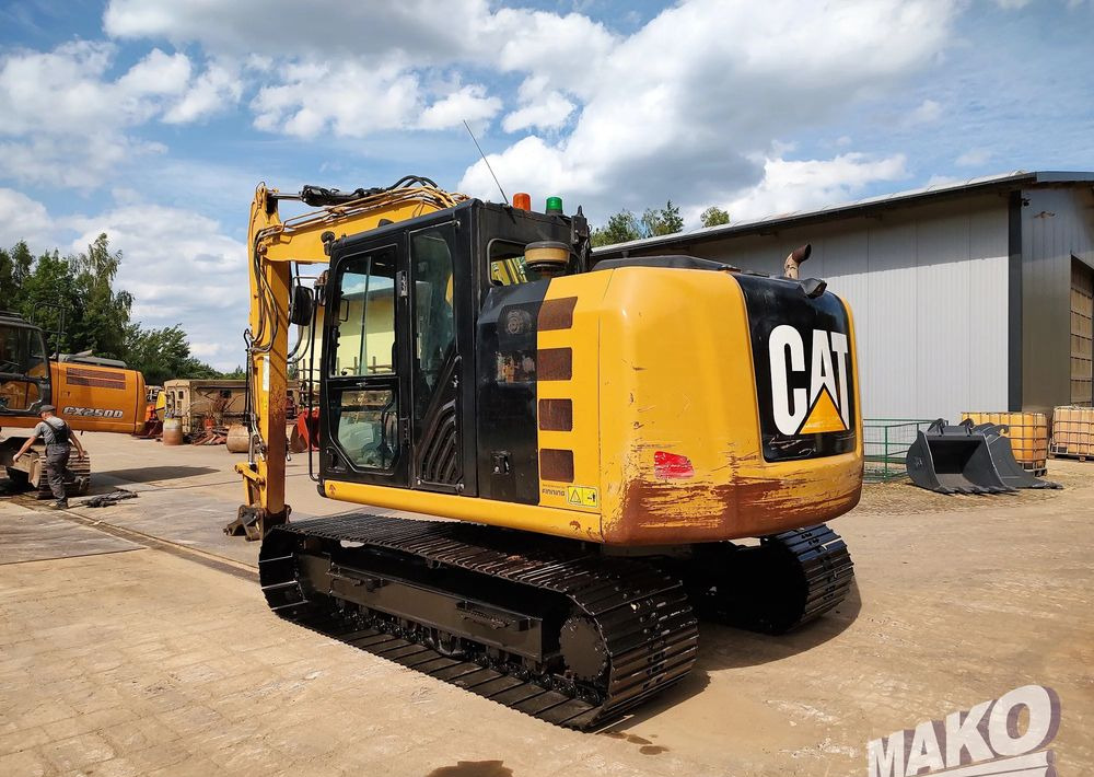 Caterpillar 312 E - Гусеничный экскаватор: фото 2 Caterpillar 312 E - Гусеничный экскаватор: фото 2