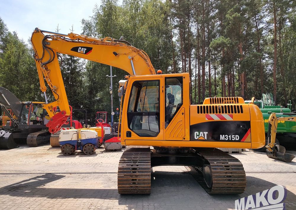 Caterpillar 315D - Гусеничный экскаватор: фото 2 Caterpillar 315D - Гусеничный экскаватор: фото 2