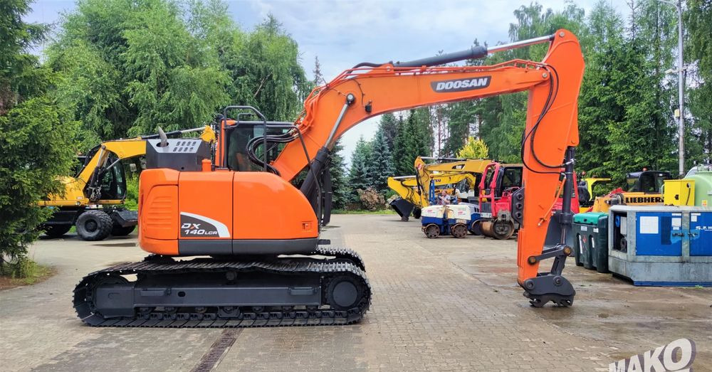 Doosan DX140LCR-5 - Гусеничный экскаватор: фото 5 Doosan DX140LCR-5 - Гусеничный экскаватор: фото 5