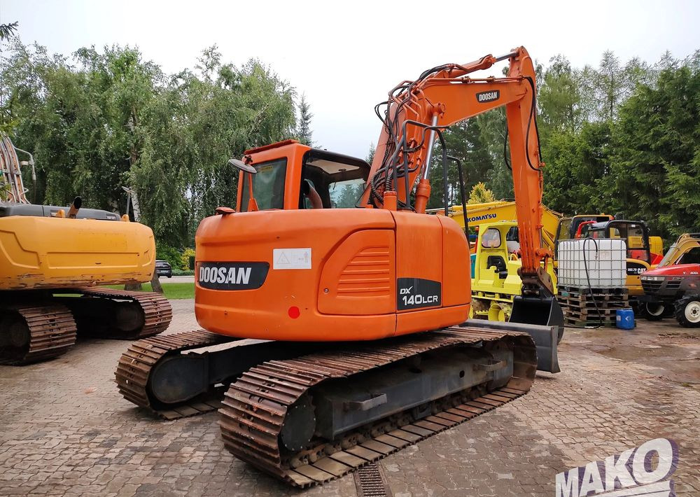 Doosan DX140LCR - Гусеничный экскаватор: фото 4 Doosan DX140LCR - Гусеничный экскаватор: фото 4