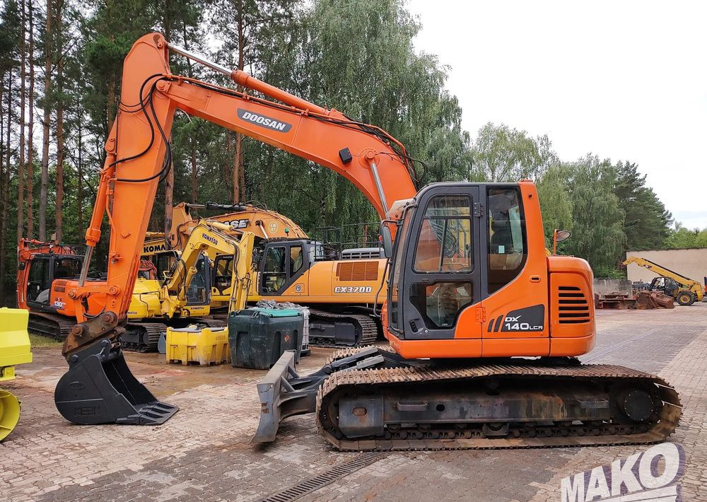 Doosan DX140LCR - Гусеничный экскаватор: фото 1 Doosan DX140LCR - Гусеничный экскаватор: фото 1