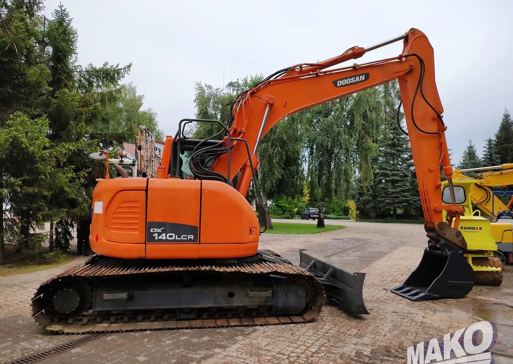 Doosan DX140LCR - Гусеничный экскаватор: фото 5 Doosan DX140LCR - Гусеничный экскаватор: фото 5