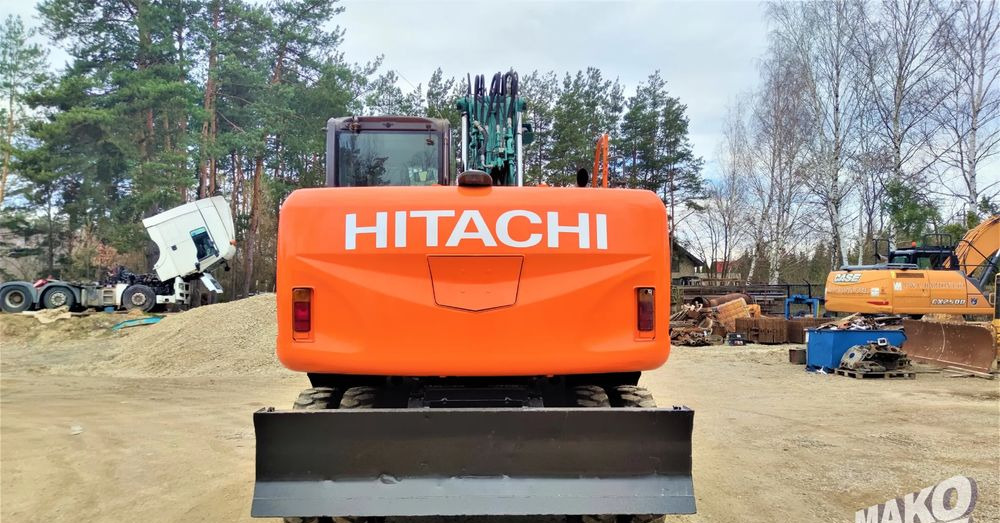 Hitachi ZX140W-3 - Колёсный экскаватор: фото 3 Hitachi ZX140W-3 - Колёсный экскаватор: фото 3