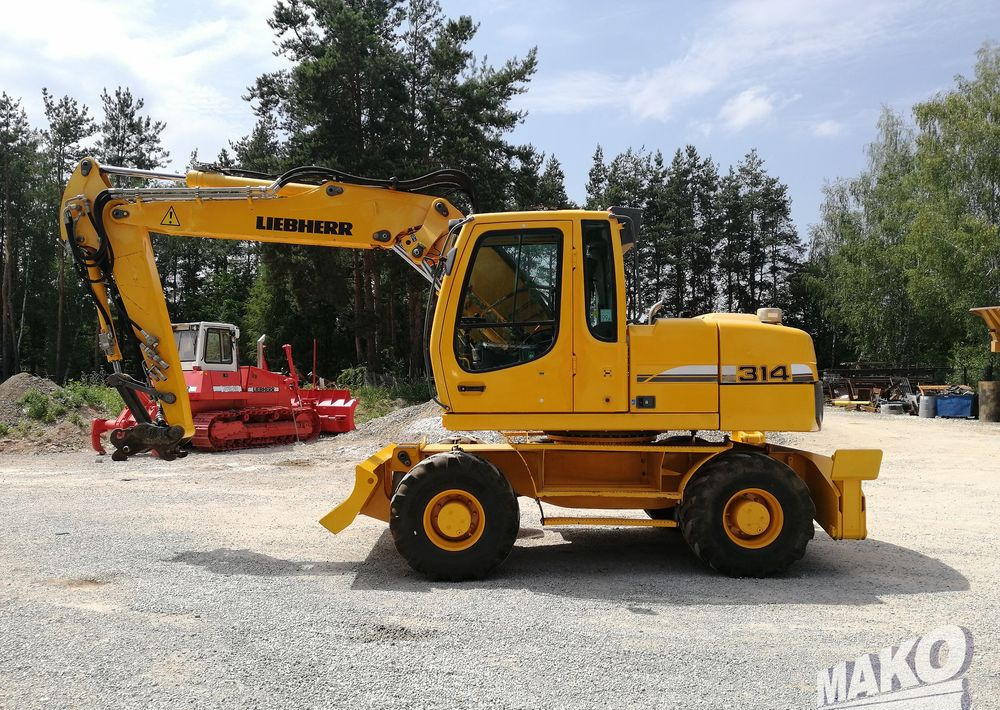 Liebherr A 314 Litronic - Колёсный экскаватор: фото 2 Liebherr A 314 Litronic - Колёсный экскаватор: фото 2