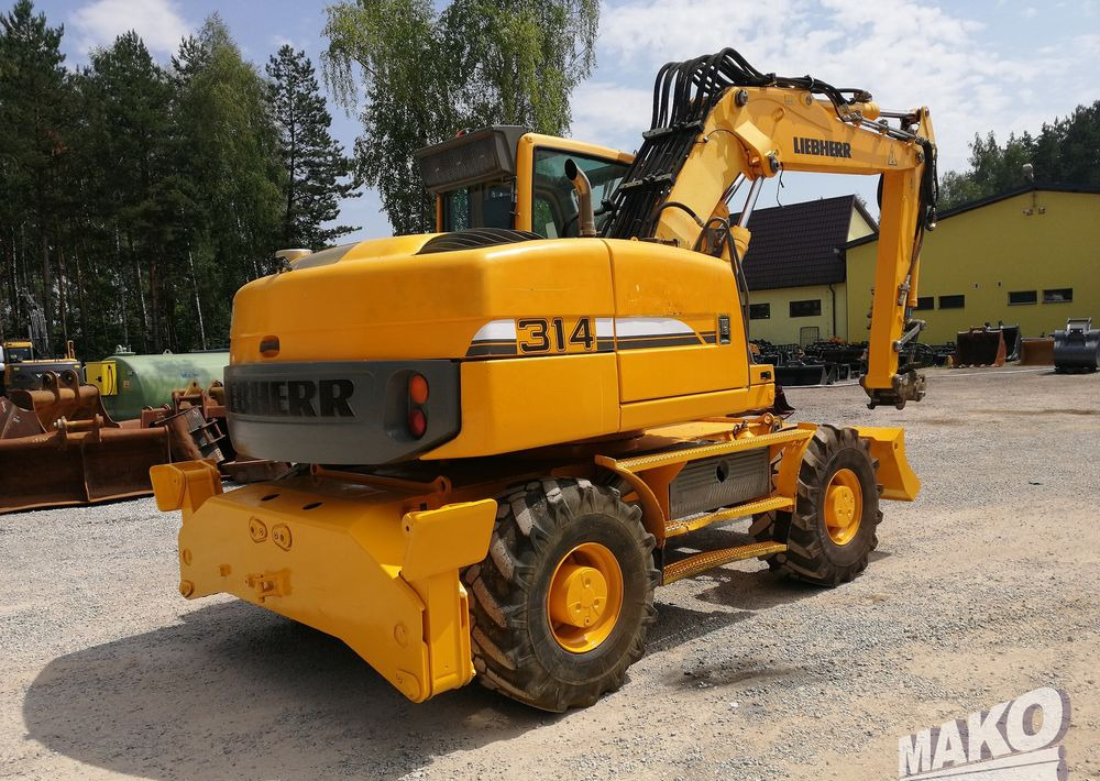 Liebherr A 314 Litronic - Колёсный экскаватор: фото 5 Liebherr A 314 Litronic - Колёсный экскаватор: фото 5