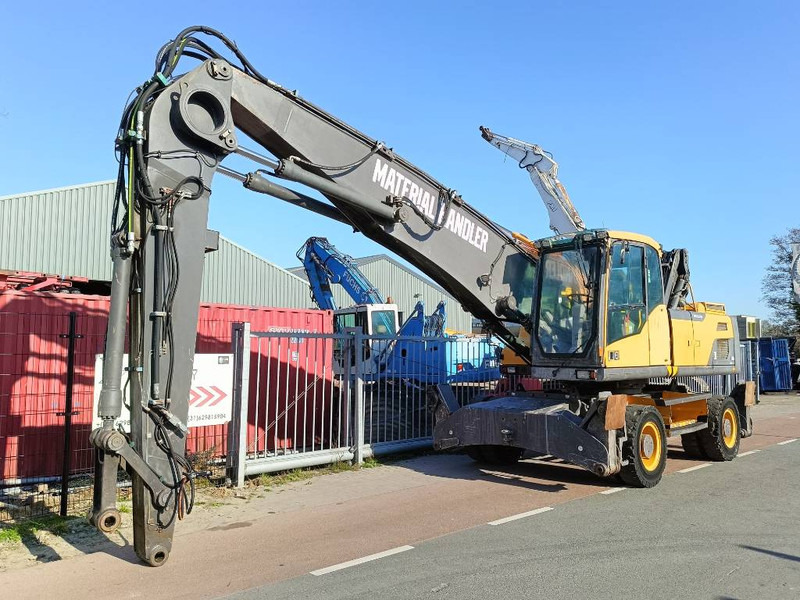 Перегружатель для транспортировки мусора Volvo EW 210 D waste industry handler 25ton umslagbagger: фото 9
