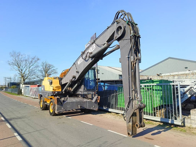 Перегружатель для транспортировки мусора Volvo EW 210 D waste industry handler 25ton umslagbagger: фото 11