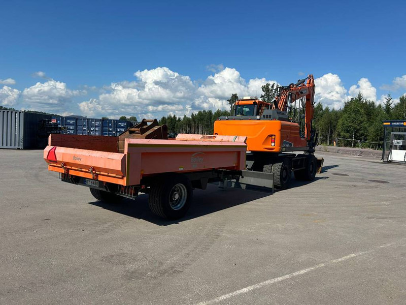 Doosan DX 140 W-5 - Колёсный экскаватор: фото 4 Doosan DX 140 W-5 - Колёсный экскаватор: фото 4