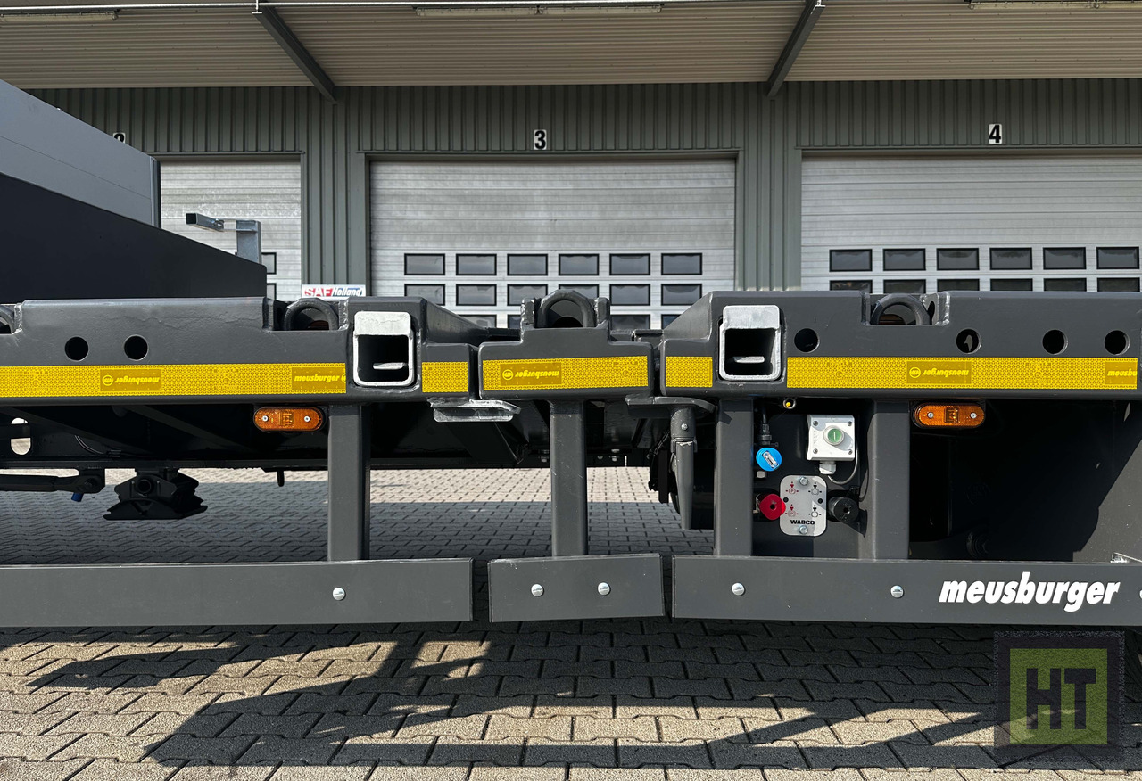 Низкорамный полуприцеп Meusburger 3-Achs-Tele-Semi mit 1 Paar Radmulden und hydr. Rampen: фото 6