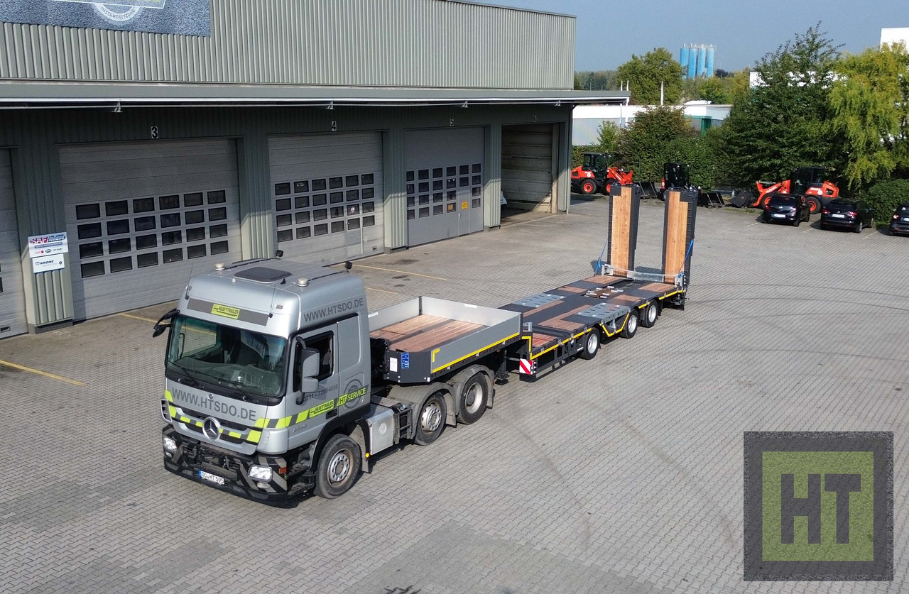 Низкорамный полуприцеп Meusburger 3-Achs-Tele-Semi mit 1 Paar Radmulden und hydr. Rampen: фото 12