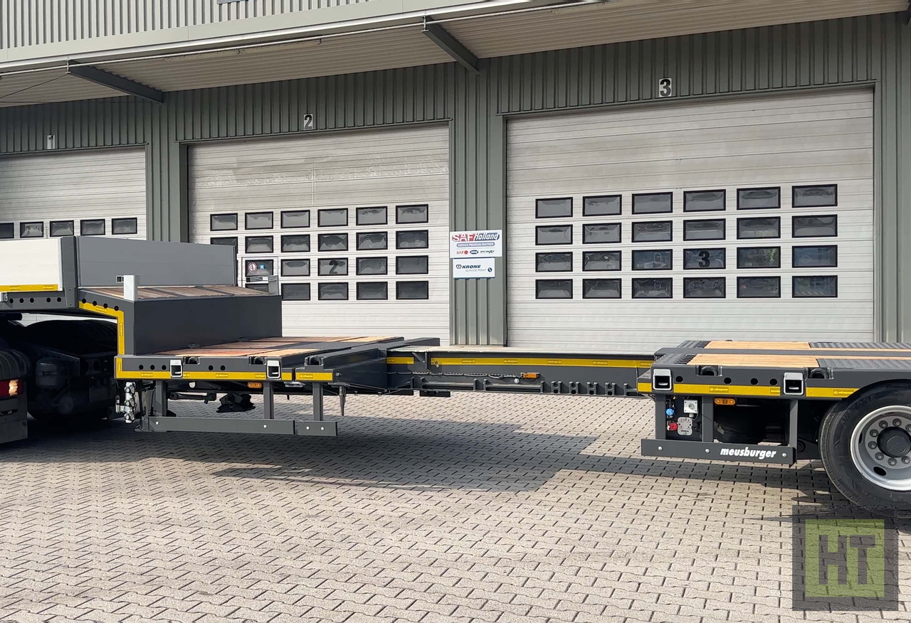 Meusburger 3-Achs-Tele-Semi mit 1 Paar Radmulden und hydr. Rampen - Низкорамный полуприцеп: фото 4 Meusburger 3-Achs-Tele-Semi mit 1 Paar Radmulden und hydr. Rampen - Низкорамный полуприцеп: фото 4