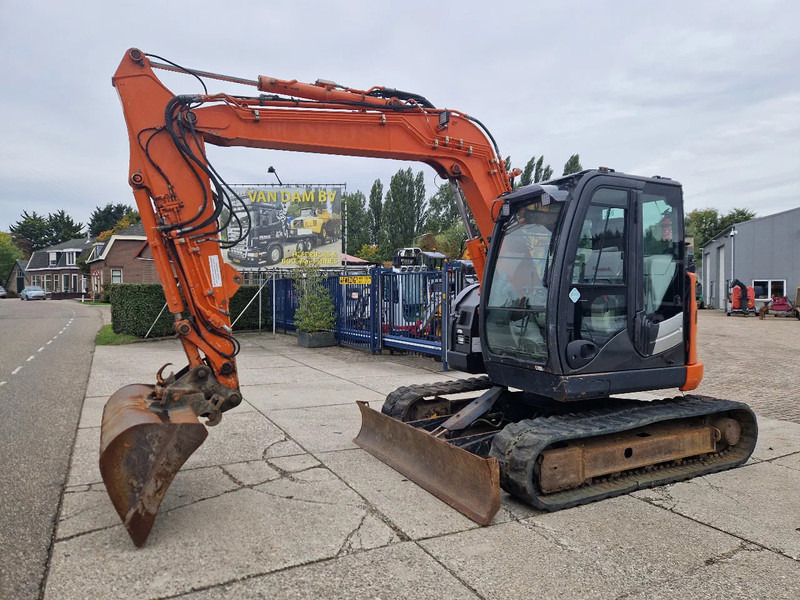 Hitachi ZX85US-5A - Мини-экскаватор: фото 1 Hitachi ZX85US-5A - Мини-экскаватор: фото 1