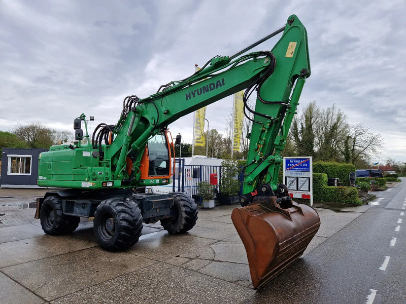 Hyundai Robex 160W-9A met 6-cilinder Cummins motor - Колёсный экскаватор: фото 3 Hyundai Robex 160W-9A met 6-cilinder Cummins motor - Колёсный экскаватор: фото 3