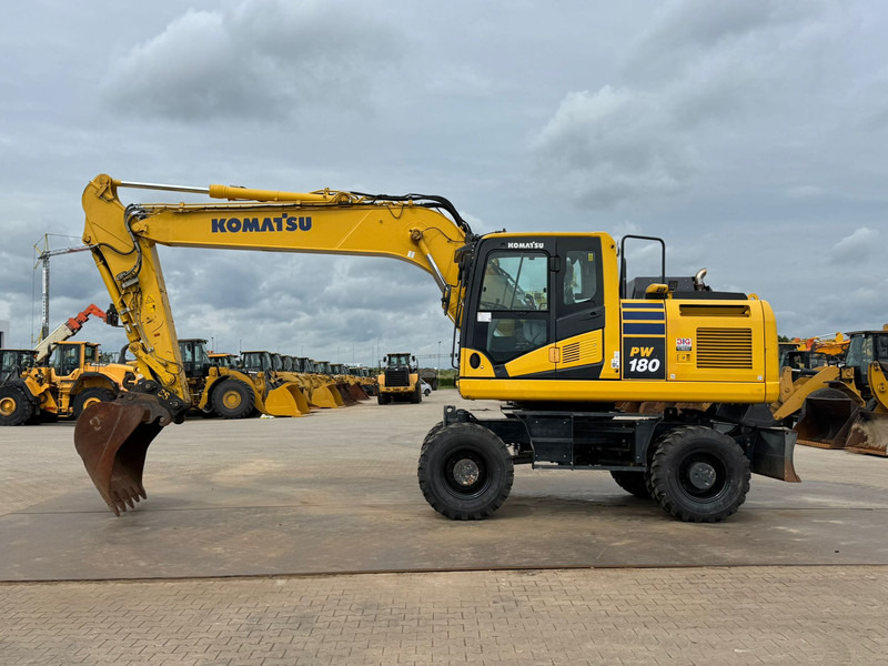Komatsu PW180-11 - Колёсный экскаватор: фото 1 Komatsu PW180-11 - Колёсный экскаватор: фото 1