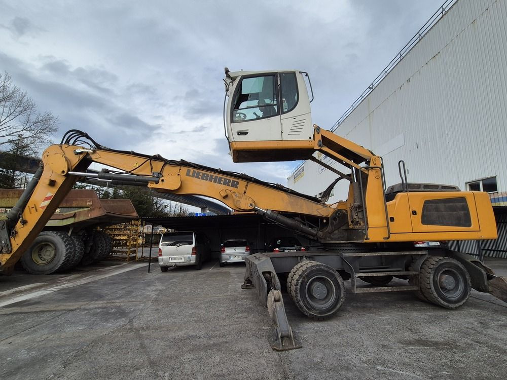 Liebherr LH30M - Перегружатель: фото 1 Liebherr LH30M - Перегружатель: фото 1