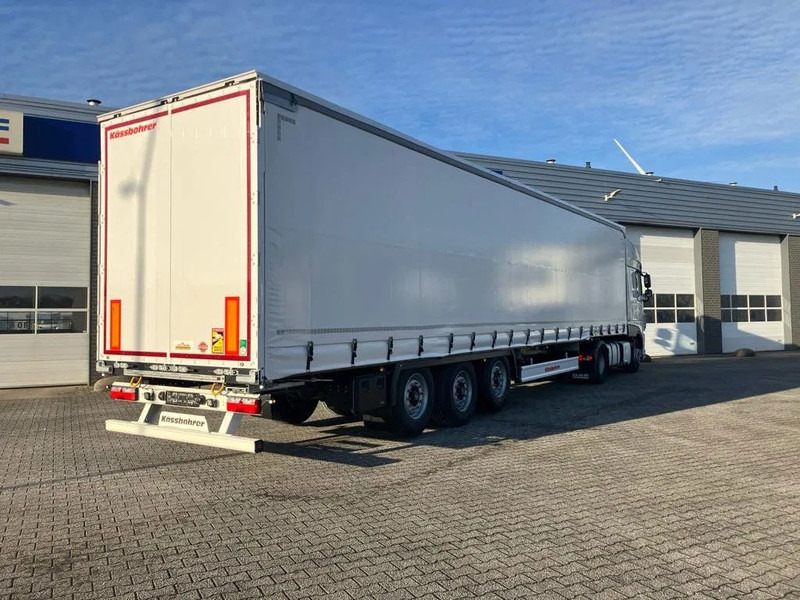 Kässbohrer SCS X / 90 - 12 / 27 Schuifzeilen met twee liftassen en hefdak 500mm - Тентованный полуприцеп: фото 5 Kässbohrer SCS X / 90 - 12 / 27 Schuifzeilen met twee liftassen en hefdak 500mm - Тентованный полуприцеп: фото 5