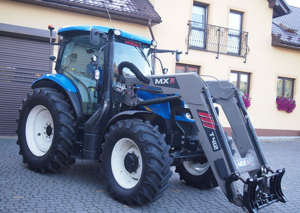 Ciągnik New Holland NH T6.140 2016 New Holland z Ładowaczem czołowym TUR - Трактор: фото 1 Ciągnik New Holland NH T6.140 2016 New Holland z Ładowaczem czołowym TUR - Трактор: фото 1