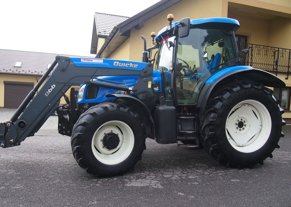 Ciągnik New Holland NH TS125A 6 cylindrów 2004 Ciągnik rolniczy New Holland TS125A - Трактор: фото 3 Ciągnik New Holland NH TS125A 6 cylindrów 2004 Ciągnik rolniczy New Holland TS125A - Трактор: фото 3