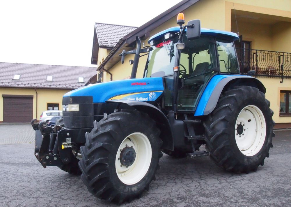 Ciągnik New Holland TM 140 2004 Przedni TUZ - Трактор: фото 3 Ciągnik New Holland TM 140 2004 Przedni TUZ - Трактор: фото 3