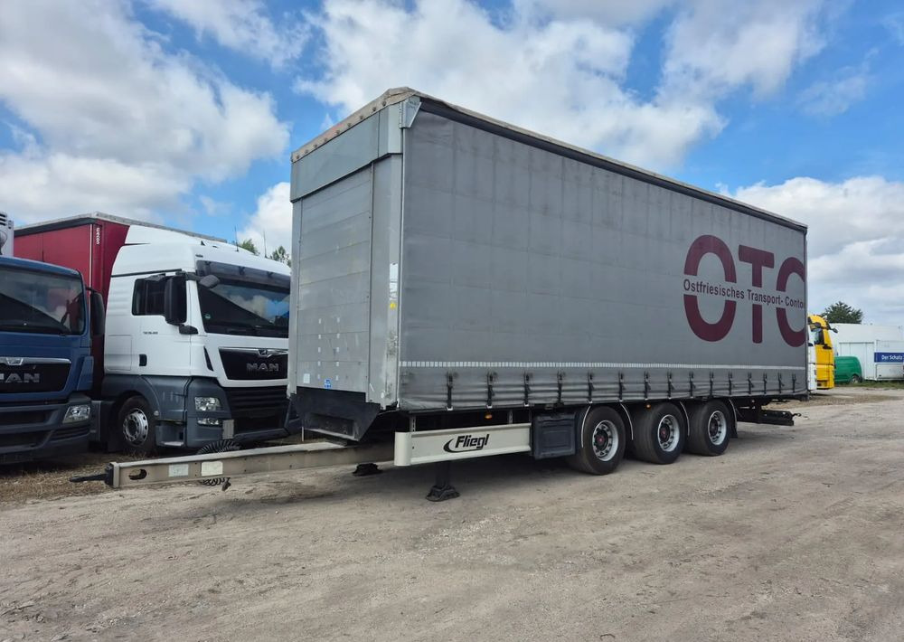 Fliegl Tandem 3 osie - Тентованный прицеп: фото 1 Fliegl Tandem 3 osie - Тентованный прицеп: фото 1