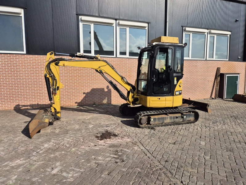 Caterpillar 303.5ECR - Мини-экскаватор: фото 1 Caterpillar 303.5ECR - Мини-экскаватор: фото 1