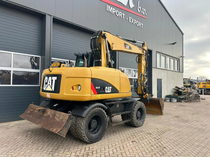 Caterpillar M313D - Колёсный экскаватор: фото 4 Caterpillar M313D - Колёсный экскаватор: фото 4