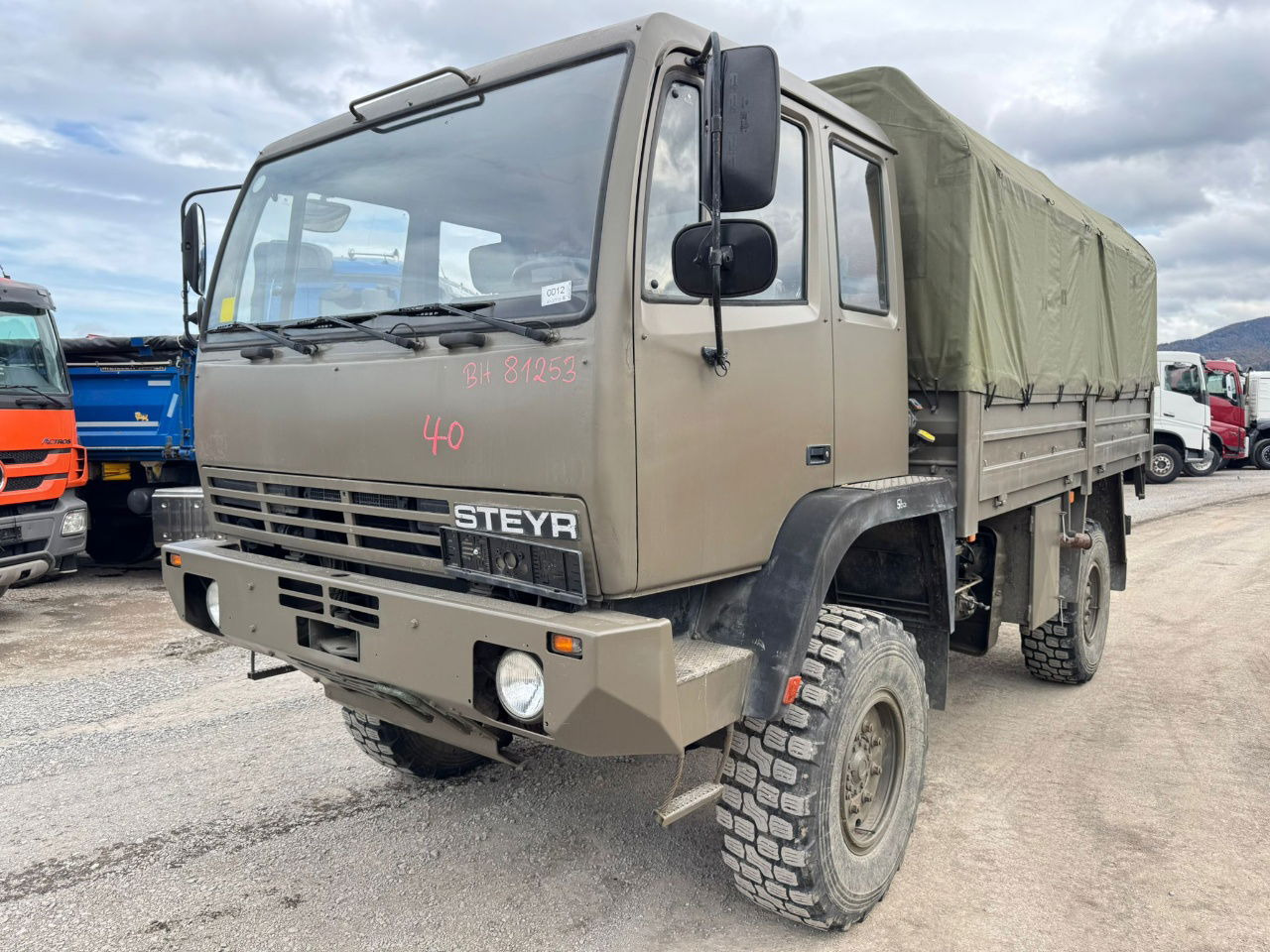 Steyr 12M18 4X4 stake body -  truck - Тентованный грузовик: фото 1 Steyr 12M18 4X4 stake body -  truck - Тентованный грузовик: фото 1