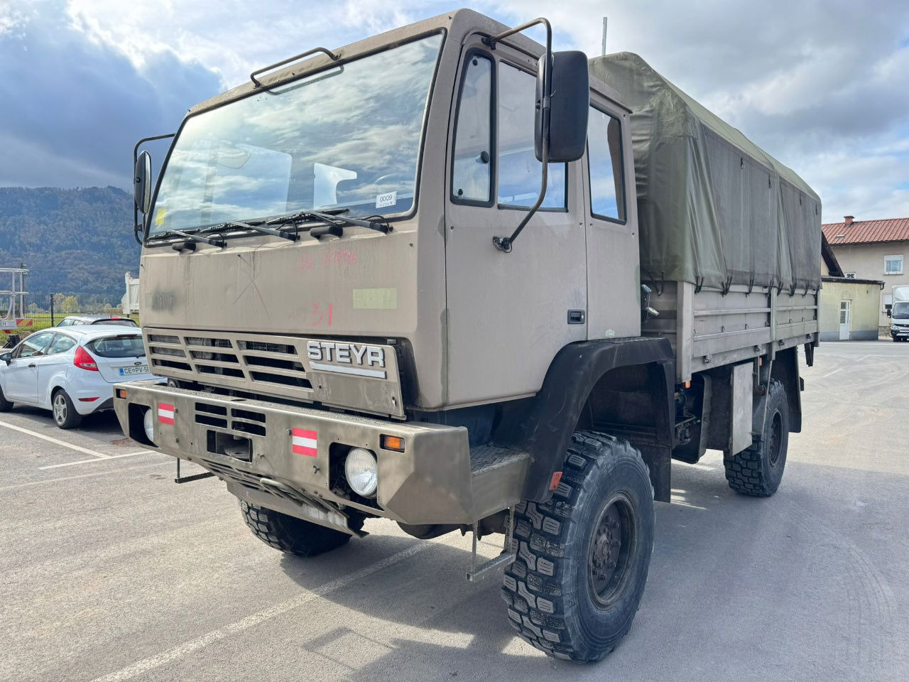 Steyr 12M18 4X4 stake body -  truck - Тентованный грузовик: фото 1 Steyr 12M18 4X4 stake body -  truck - Тентованный грузовик: фото 1