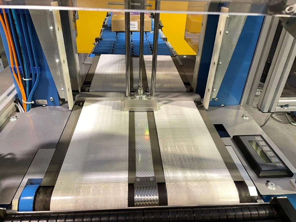 ATS Tanner UltraSonic US 2000-AB transit banding machine with pneumatic product hold-down and infeed roller table - Упаковочное оборудование: фото 5 ATS Tanner UltraSonic US 2000-AB transit banding machine with pneumatic product hold-down and infeed roller table - Упаковочное оборудование: фото 5