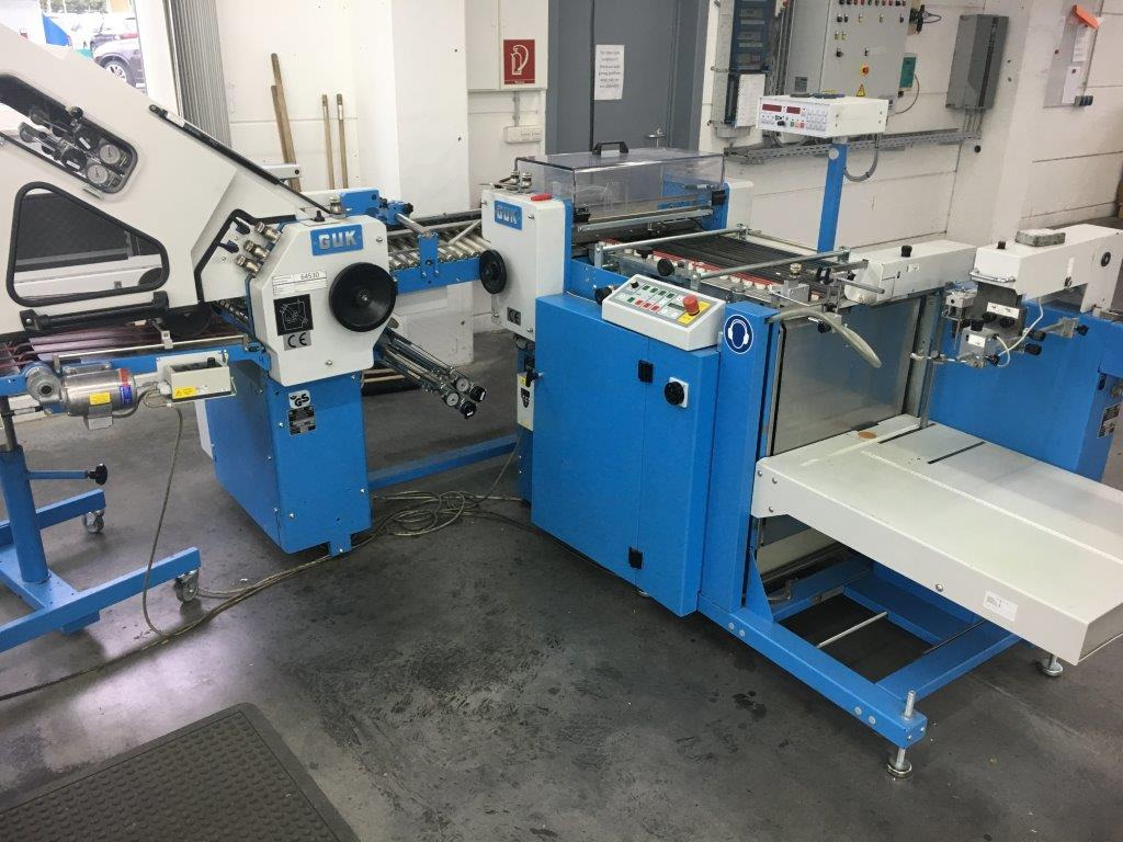 GUK SM 50-2 cutting machine with feeder - Переплетная машина: фото 1 GUK SM 50-2 cutting machine with feeder - Переплетная машина: фото 1