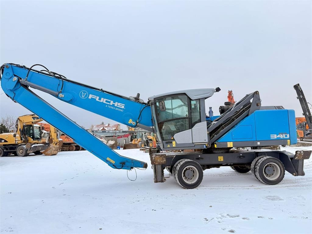 Fuchs MHL340 - Перегружатель: фото 1 Fuchs MHL340 - Перегружатель: фото 1