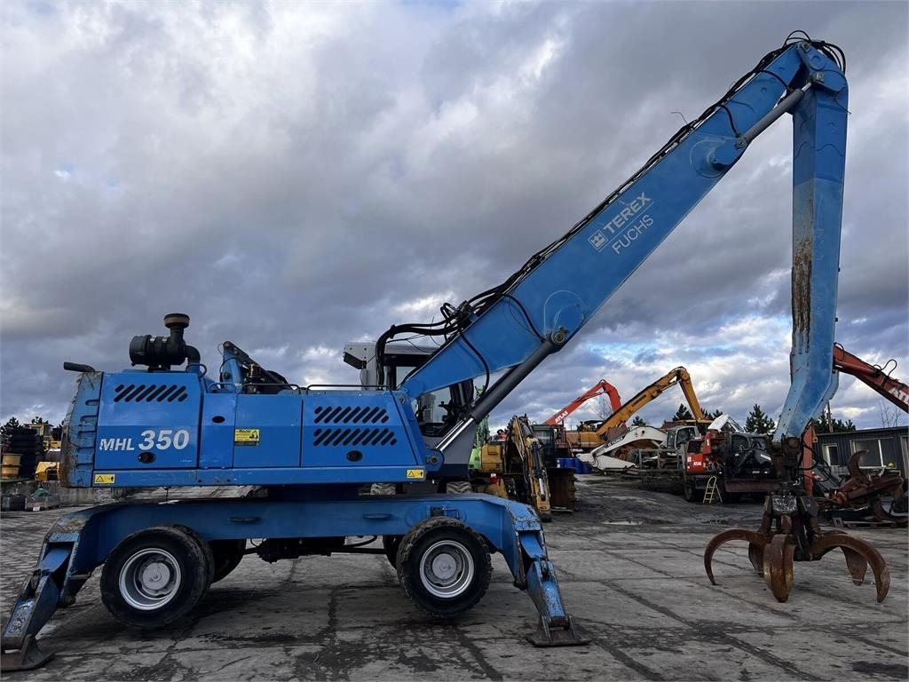 Fuchs MHL350 D - Перегружатель: фото 1 Fuchs MHL350 D - Перегружатель: фото 1