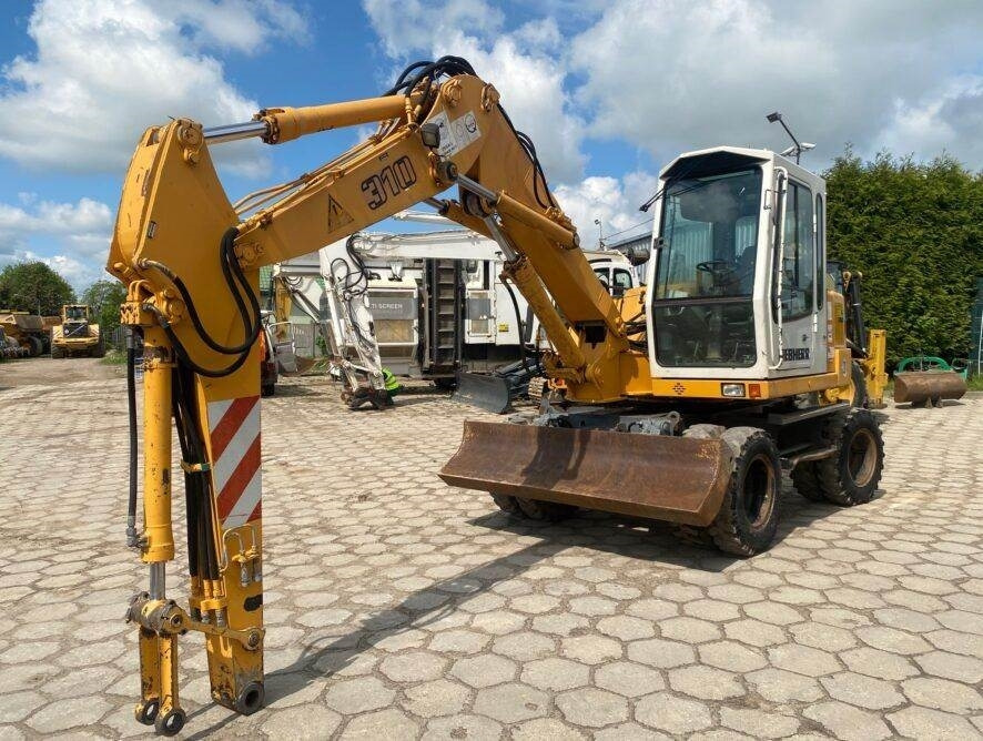 Liebherr A310B  - Колёсный экскаватор: фото 4 Liebherr A310B  - Колёсный экскаватор: фото 4