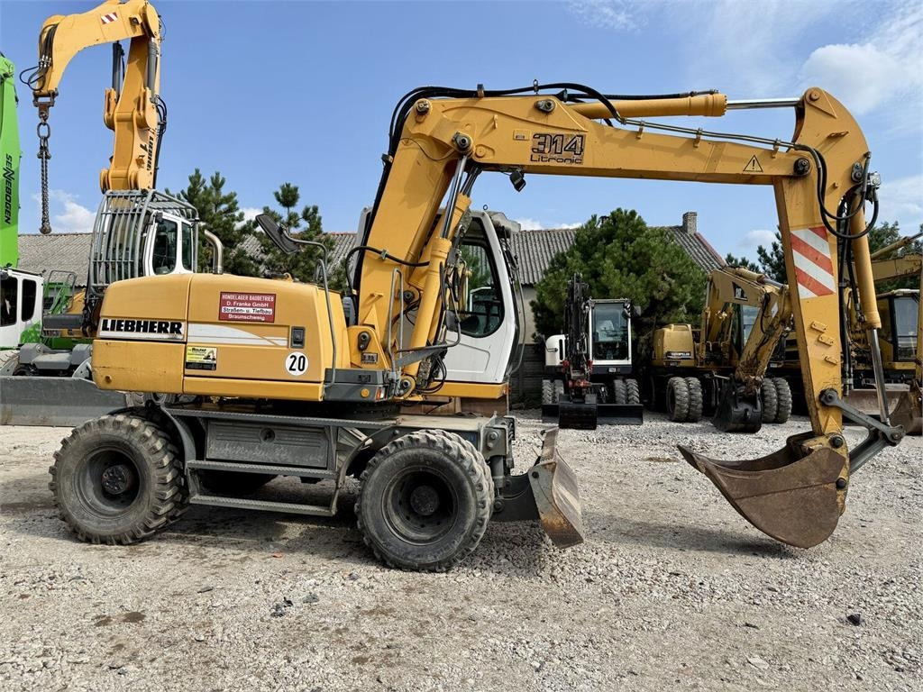 Liebherr A314 - Колёсный экскаватор: фото 5 Liebherr A314 - Колёсный экскаватор: фото 5