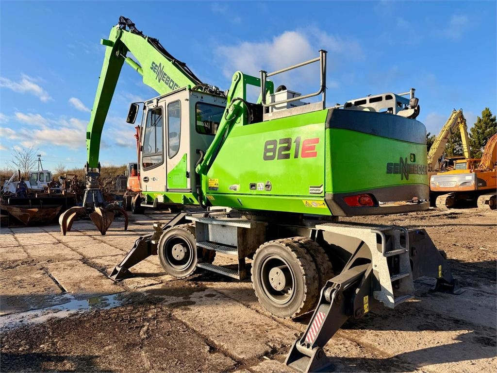 Sennebogen 821 - Перегружатель: фото 1 Sennebogen 821 - Перегружатель: фото 1