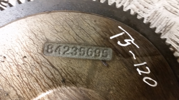 New Holland T5. 100, 110, 120 Engine Flywheel And Ring Gear 47808010, 84235695 - Маховик для Тракторов: фото 2 New Holland T5. 100, 110, 120 Engine Flywheel And Ring Gear 47808010, 84235695 - Маховик для Тракторов: фото 2