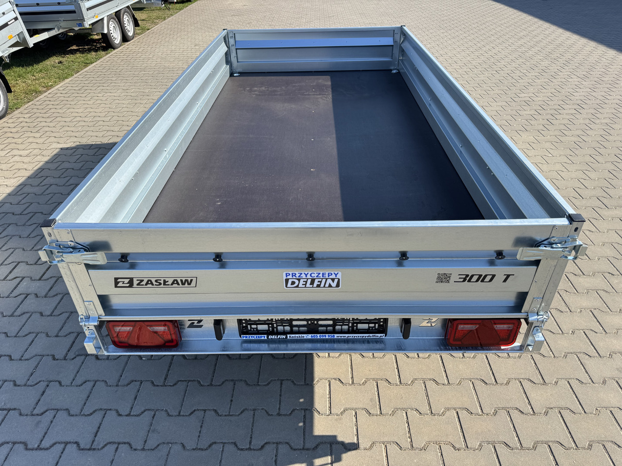 ZASŁAW 300T - przyczepa skrzyniowa 2 osie / 750kg - Прицеп для легкового автомобиля: фото 5 ZASŁAW 300T - przyczepa skrzyniowa 2 osie / 750kg - Прицеп для легкового автомобиля: фото 5