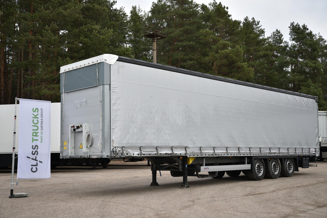 Schmitz Cargobull SCS24/L Varios - Тентованный полуприцеп: фото 1 Schmitz Cargobull SCS24/L Varios - Тентованный полуприцеп: фото 1
