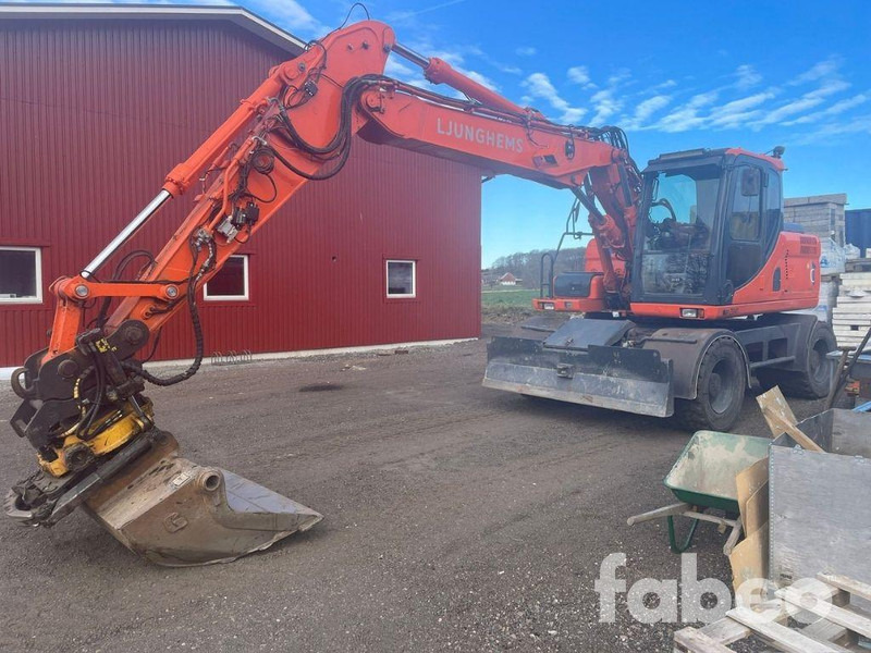Doosan DX160W - Колёсный экскаватор: фото 1 Doosan DX160W - Колёсный экскаватор: фото 1