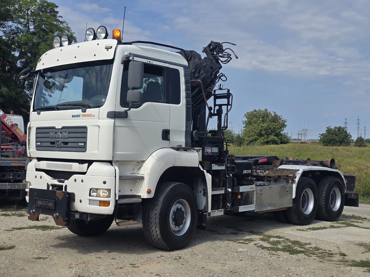 MAN TGA 26.440 6X6 / HOOK SYSTEM / HIAB 166D REMOTE SPECIAL PRICE ONLY THIS YEAR - Крюковой мультилифт, Автоманипулятор: фото 1 MAN TGA 26.440 6X6 / HOOK SYSTEM / HIAB 166D REMOTE SPECIAL PRICE ONLY THIS YEAR - Крюковой мультилифт, Автоманипулятор: фото 1